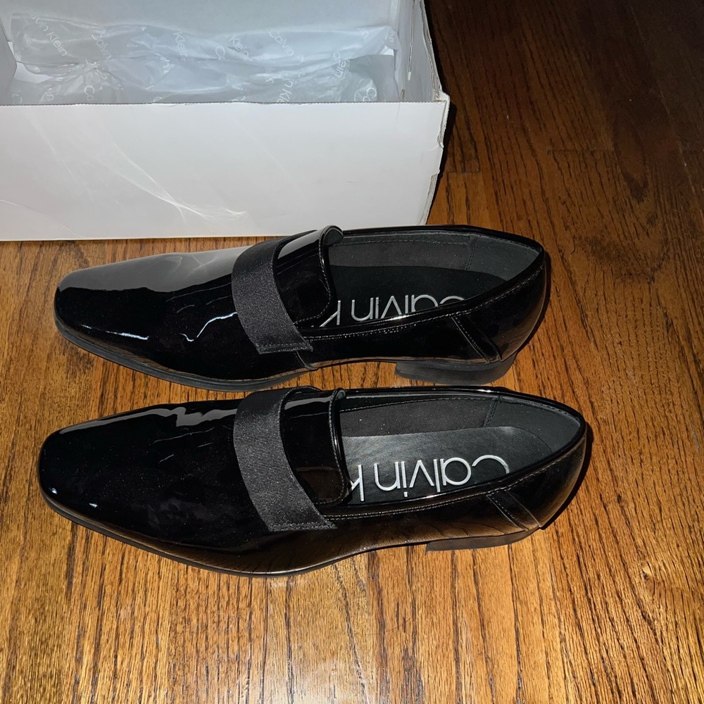 Brand new men’s Calvin Klein black leather dress shoes never worn new in box